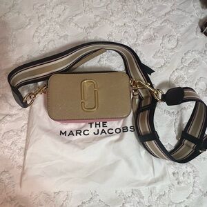 Tan with pink striped strap Marc Jacob’s camera bag small